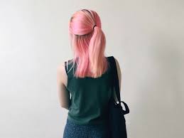 Why did my hair turn pink after bleaching ?